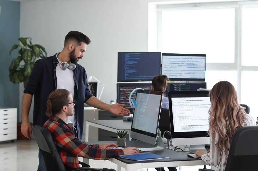 Team of programmers working in the office