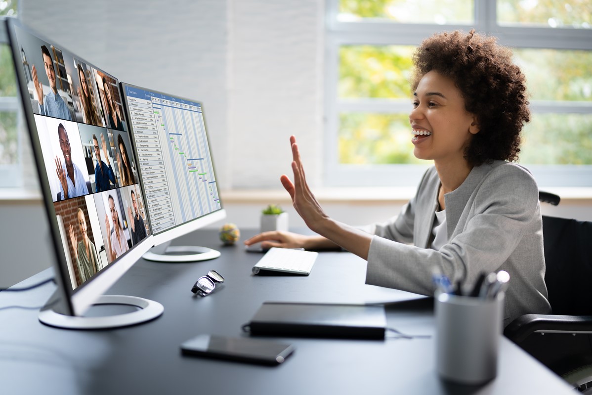 Woman on a video conference while discussing reporting analytics and project progress